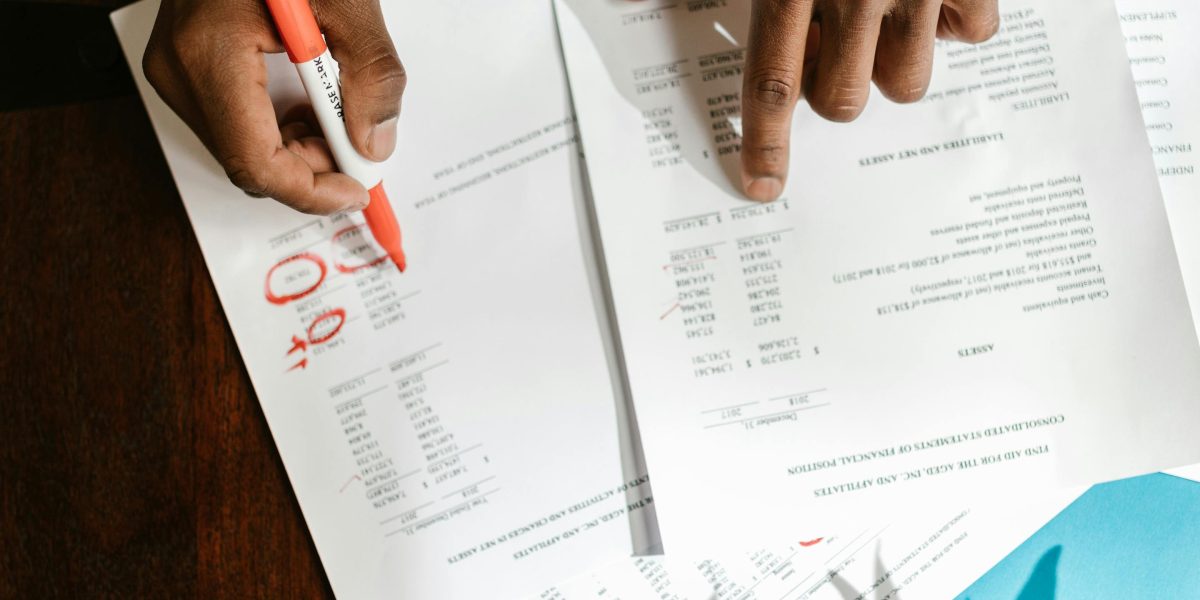 A person looks frustrated while reviewing a report, symbolizing the challenge of incorrect AI-generated data.