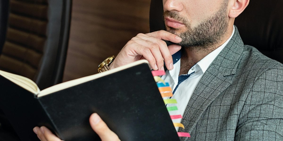 A business professional contemplating a difficult decision, symbolizing the trust gap in generative AI.