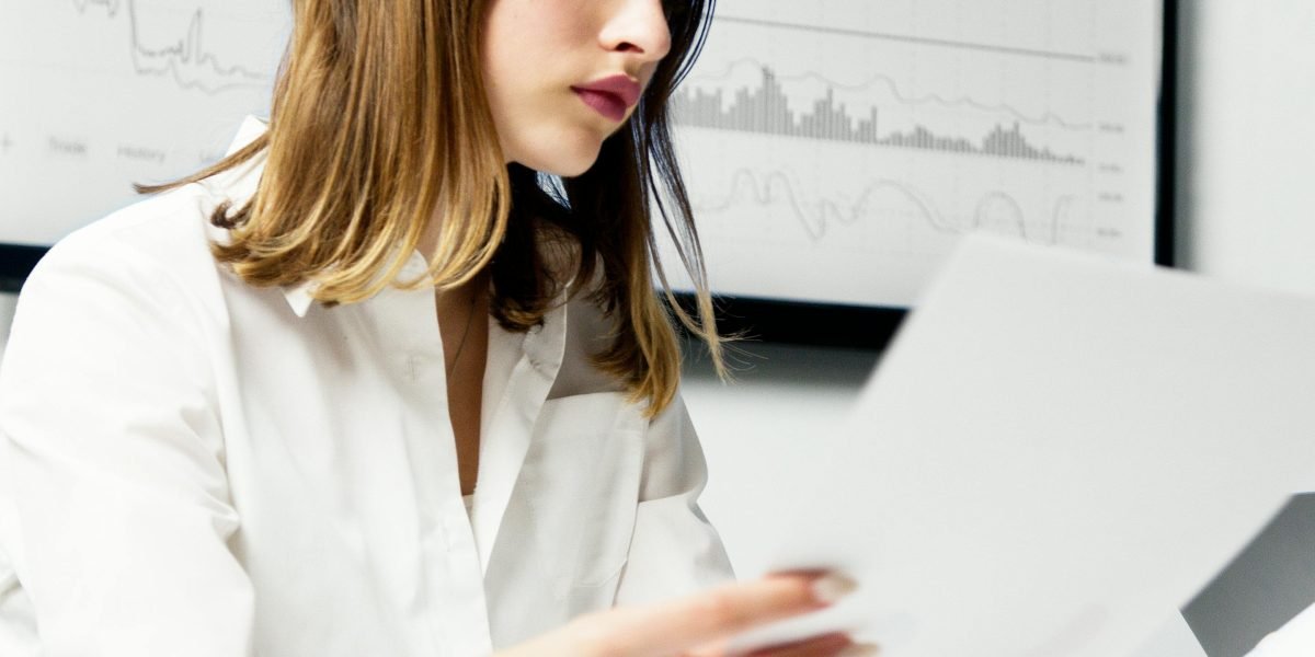 A professional contemplating the negative impact of inaccurate AI-generated reports on business outcomes.
