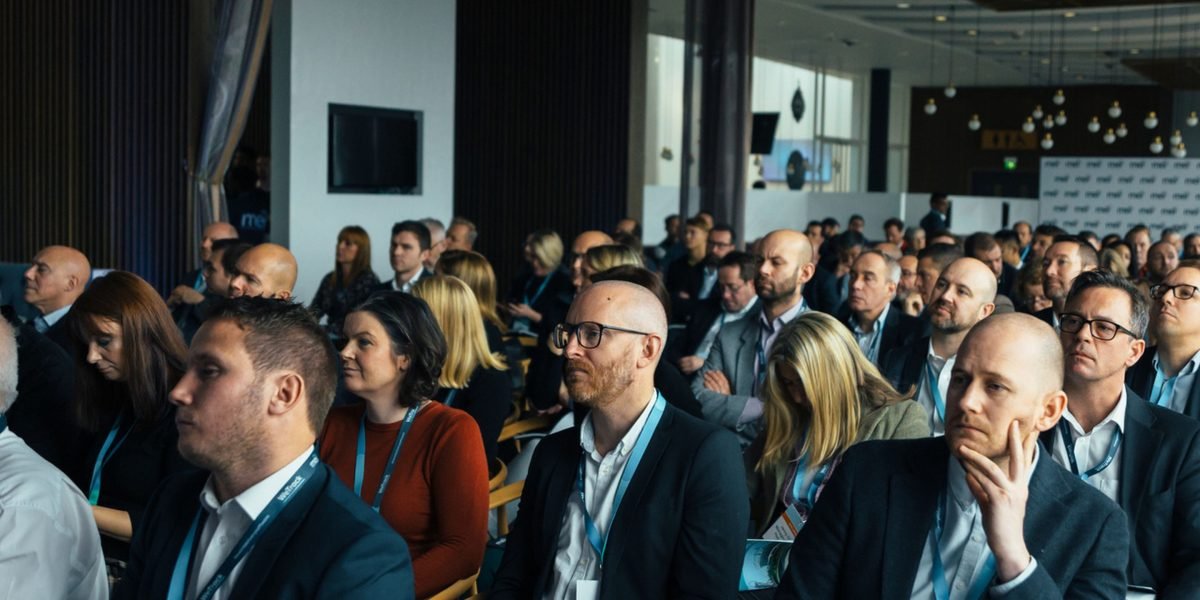 Exploring the latest AI tools and solutions at a tech conference, showcasing the rapid advancements in the field.
