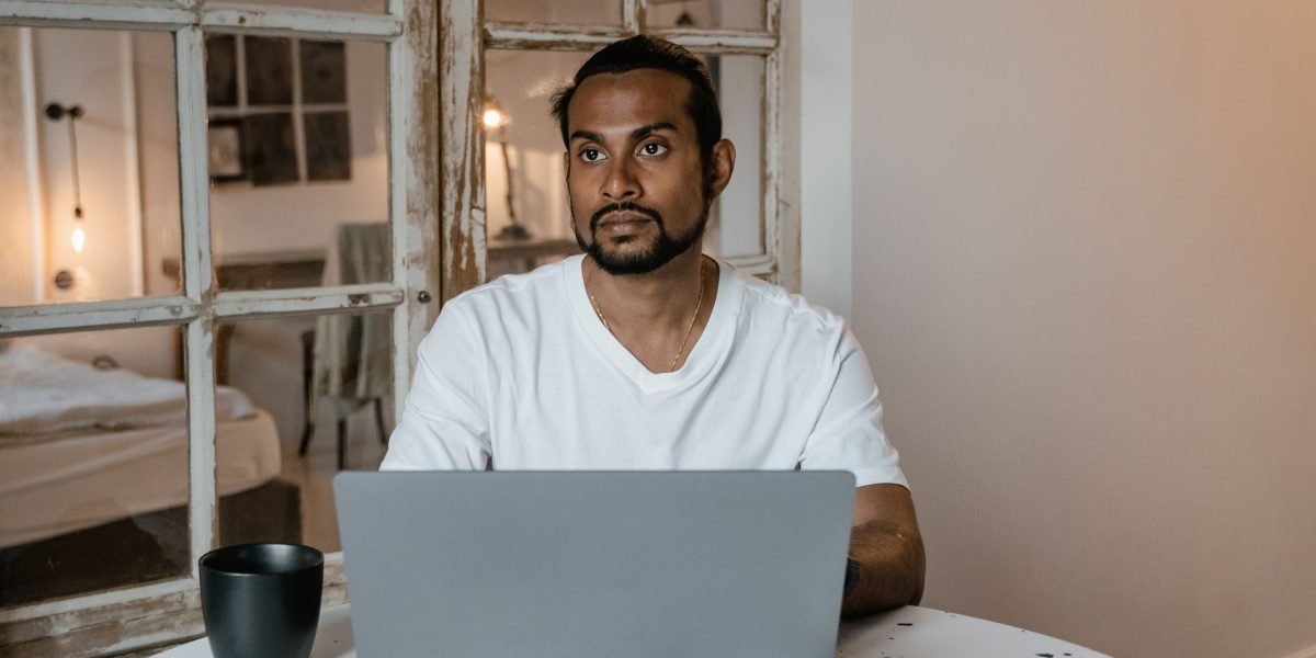 A remote professional meticulously reviewing data, embodying the critical responsibility of validating AI-generated information.