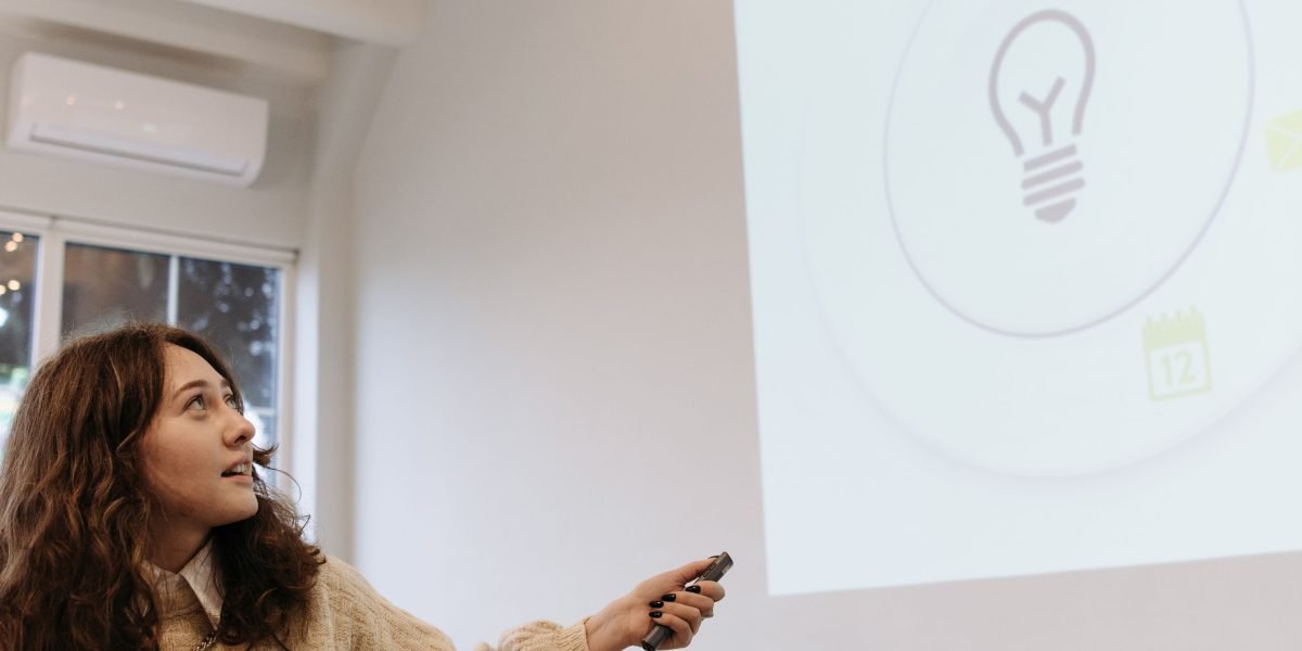 A person presenting data findings to a group, emphasizing the importance of clear communication.