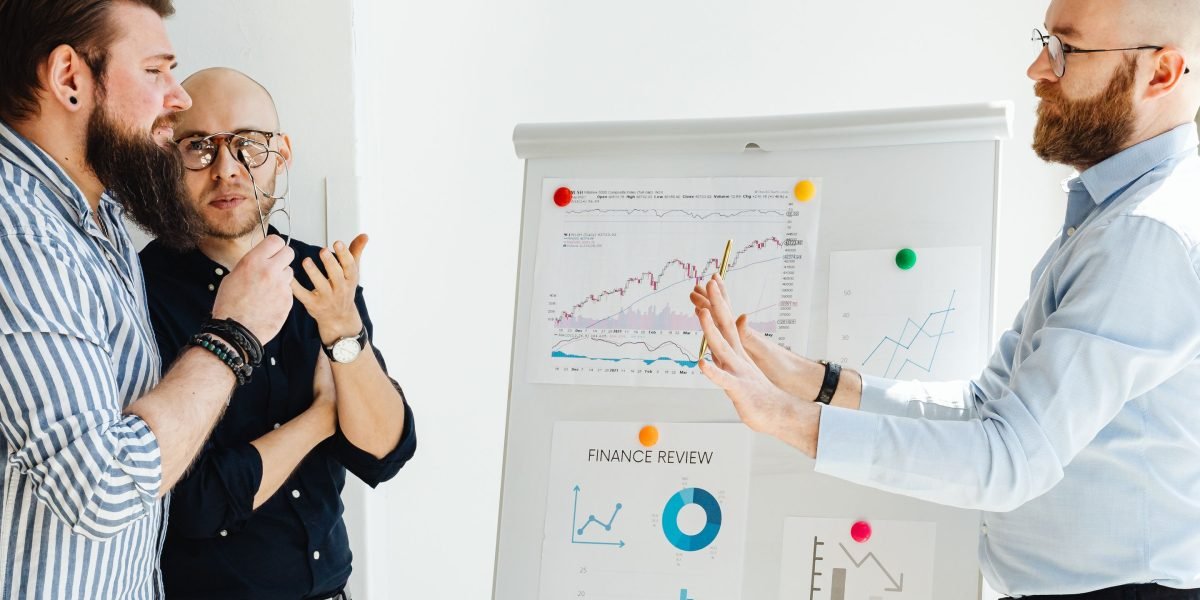 A team collaborates to review and debug complex code, addressing issues stemming from AI-generated outputs.