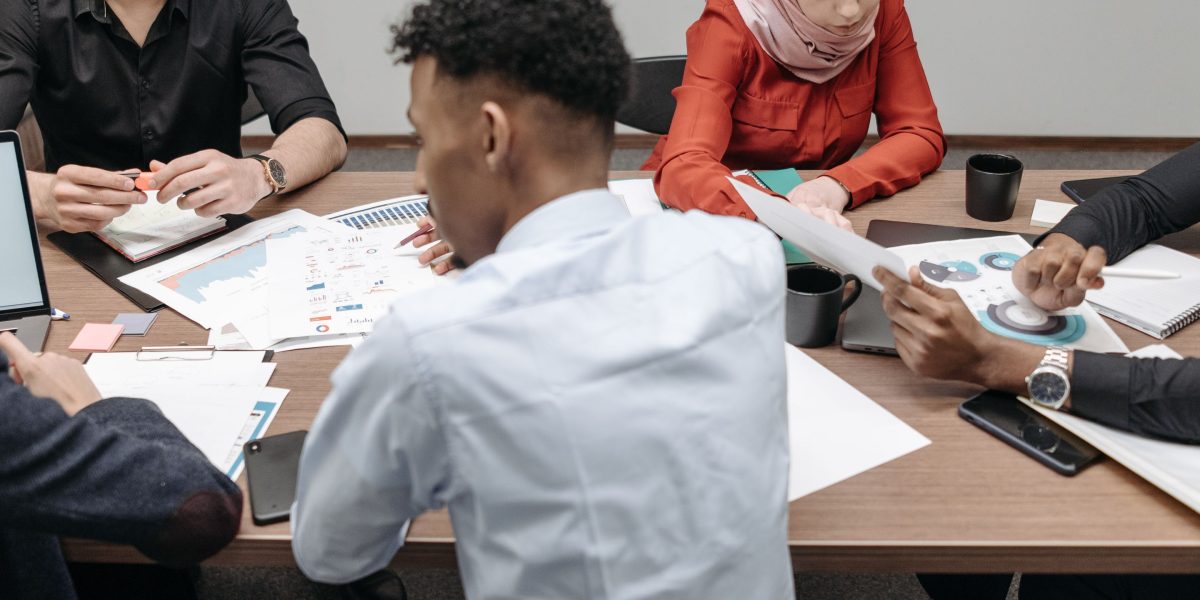 A visually distinct image of a diverse team collaborating, emphasizing the combined efforts of varied experts.