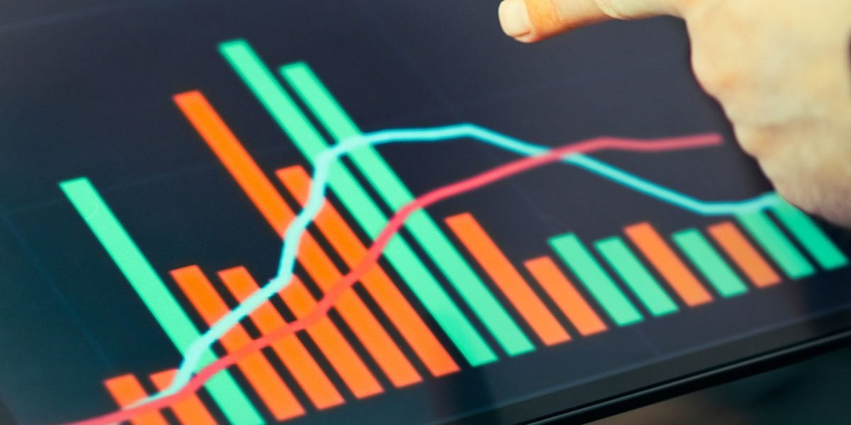 A professional monitors key performance indicators and AI outputs on a dashboard, ensuring continuous reliability.